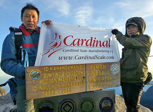 Cardinal Flag Flies Atop Mount Kinabalu in Southeast Asia