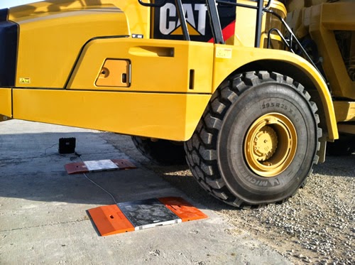 Walz Scale Provides Portable Wheel Weighers for Caterpillar Mining Trucks